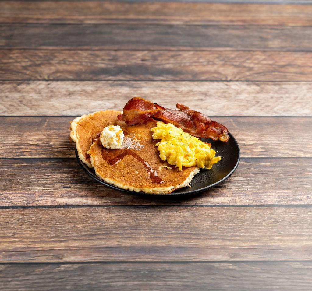 Ladies Special #2 Breakfast · 1 egg any style, 2 golden brown pancakes, choice of 4 strips of bacon, 4 sausage links, ham, sausage patties, Canadian bacon or turkey sausage with toast or hash browns.
