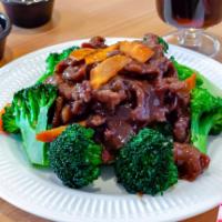 5. Beef Broccoli  · Sliced beef, broccoli, carrot sauteed with brown sauce.