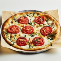 Ischia Pizza · Extra virgin olive oil with fresh mozzarella, Roma tomatoes, fresh basil and garlic.