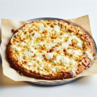 Great White Pizza · Extra virgin olive oil with a mixture of ricotta, mozzarella and feta cheese, topped with fr...