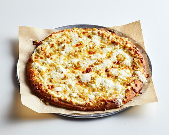 Great White Pizza · Extra virgin olive oil with a mixture of ricotta, mozzarella and feta cheese, topped with fresh garlic.
