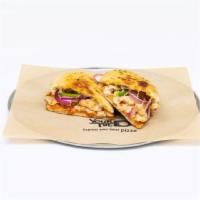 Buffalo Chicken Panini · House-made Buffalo sauce with red onions, fresh jalapenos and grilled chicken, topped with s...
