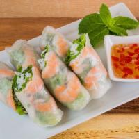 3. Goi Cuon Spring Roll · 2 pieces. Salad, pork, shrimp and peanut sauce.