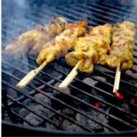 Chicken Satay · Grilled chicken on skewer marinated in coconut base spices served with cucumber salad and th...