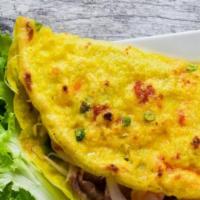 Banh Xeo · Vietnamese crepe. Mixture of shrimp and bean sprout folded in a rice powder pancake served w...