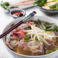 Pho Dac Biet · Gluten free. Beef noodle soup with combination of rare eye round, and well-done flank.