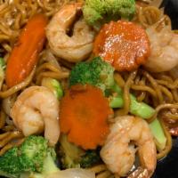 Mi Xao Dinner · Chicken stir-fried with lo mein noodle, onion, scallion, carrot, bean sprout and broccoli. S...