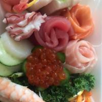 Sashimi Deluxe · 17 pieces of fresh sashimi. Tuna, salmon, shrimp, white fish and more.