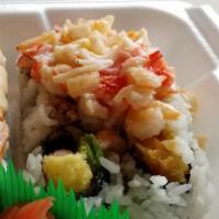 TNT · Sweet shrimp and crab on top. shrimp tempura, crunch, avocado with sake sauce.