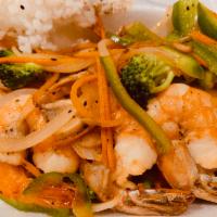 GD7. Shrimp Skewer · Grilled 8 pieces of shrimp. Choice of mild, medium or spicy.
