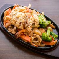 Seafood Combination Hibachi Dinner · Shrimp, scallop, green mussel, white fish and soft shell crab with sauteed vegetables.