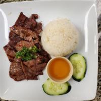 64. Com Bo Nuong · Grilled beef over steam rice.
