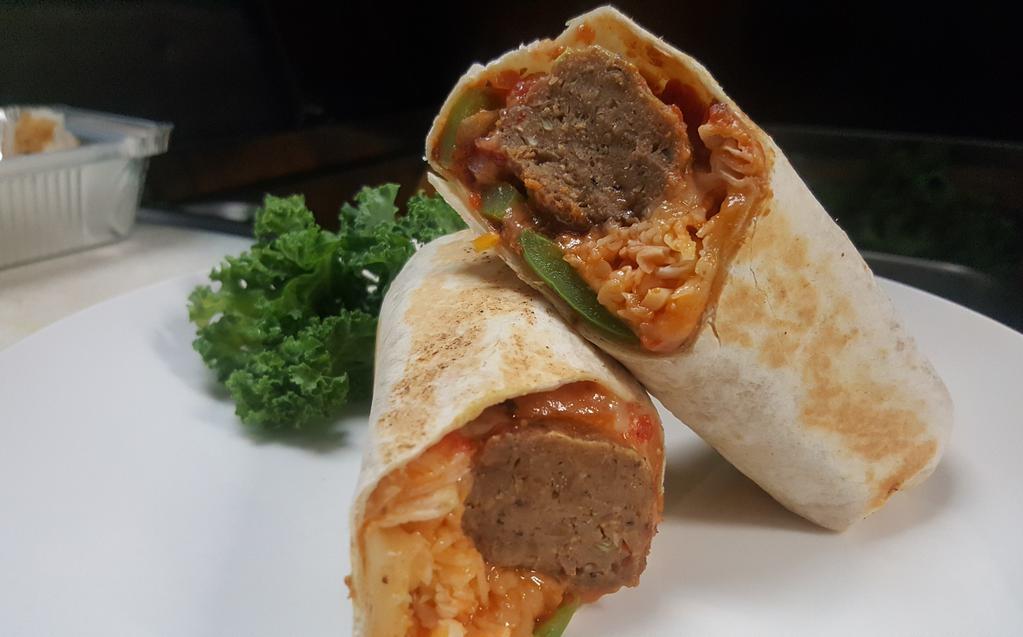 Vegetarian meatballs wrap · Garlic Meatless meatball grill pepper onions tomato sauce melted muenster cheese 