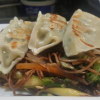 Dumpling with Japanese Soba Dinner · Grilled veggie dumplings with stir fried soba noodles and vegetables.(vegan)
