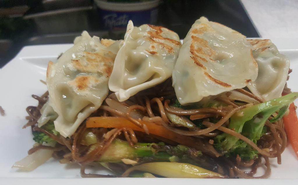 Dumpling with Japanese Soba Dinner · Grilled veggie dumplings with stir fried soba noodles and vegetables.(vegan)