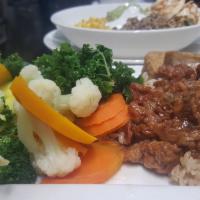 Zen Dinner Platter VG · Hearty plate of steam veg, brown rice, marinated tofu and citrus seitan. Vegan.