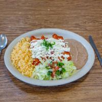  Enchiladas Mexicanas · 3 beef, shredded chicken or cheese enchiladas. Covered with our delicious guajillo red sauce...