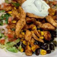 Burrito Bowl Salad · Grilled chicken, corn, white rice, black beans, lettuce, pico, shredded cheese and sour cream.