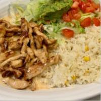Pollo a la Crema · Grilled chicken with a special cheese sauce. Served with white rice, lettuce, guacamole and ...