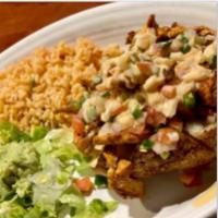 Papa Pollo · Big baked potato filled with grilled chicken, topped with cheese dip and pico de gallo. Serv...
