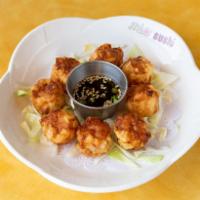 Shrimp Shumai · 8 pieces. Fried shrimp dim sum.
