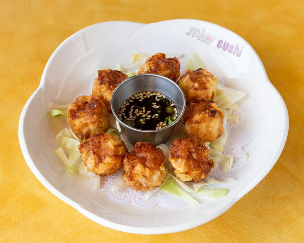 Shrimp Shumai · 8 pieces. Fried shrimp dim sum.