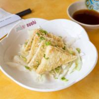 Agedashi Tofu · Deep fried tofu (4 pieces), bonito flakes, green onion, radish, and tempura sauce.