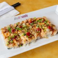 Sushizza · Crab, green onion, sesame seed, sweet sauce, hot sauce and creamy sauce. Baked.