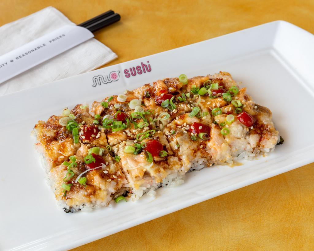 Sushizza · Crab, green onion, sesame seed, sweet sauce, hot sauce and creamy sauce. Baked.