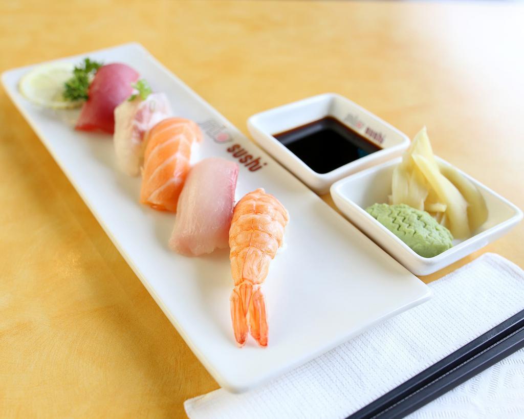 Sushi Appetizers · Raw. Tuna, salmon, white fish and shrimp (ebi).