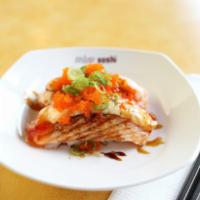 Seared Sweet Salmon Nigiri · Slightly seared. Spicy mayo, sweet chili sauce, unagi sauce, green onion, masago, sesame seed.