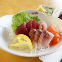 Sashimi Combo · 3 pieces tuna, 3 pieces yellowtail and 3 pieces salmon. Served with steamed rice. Choice of ...