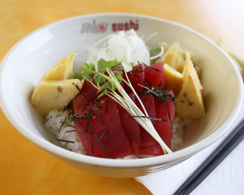 Tuna Donburi · Raw. 8 pieces tuna sashimi and tamago. Served on a bed of sushi rice.