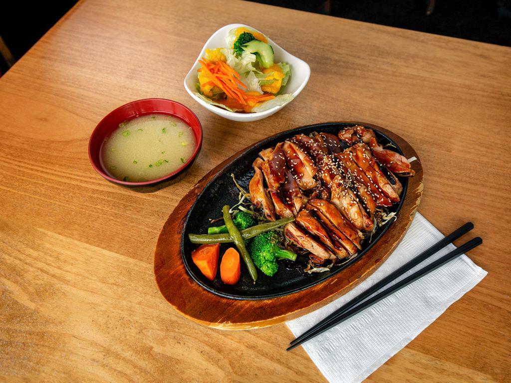 Chicken Teriyaki · Grilled chicken, teriyaki sauce, steamed vegetables, and sesame seed. Served with small Mio salad.