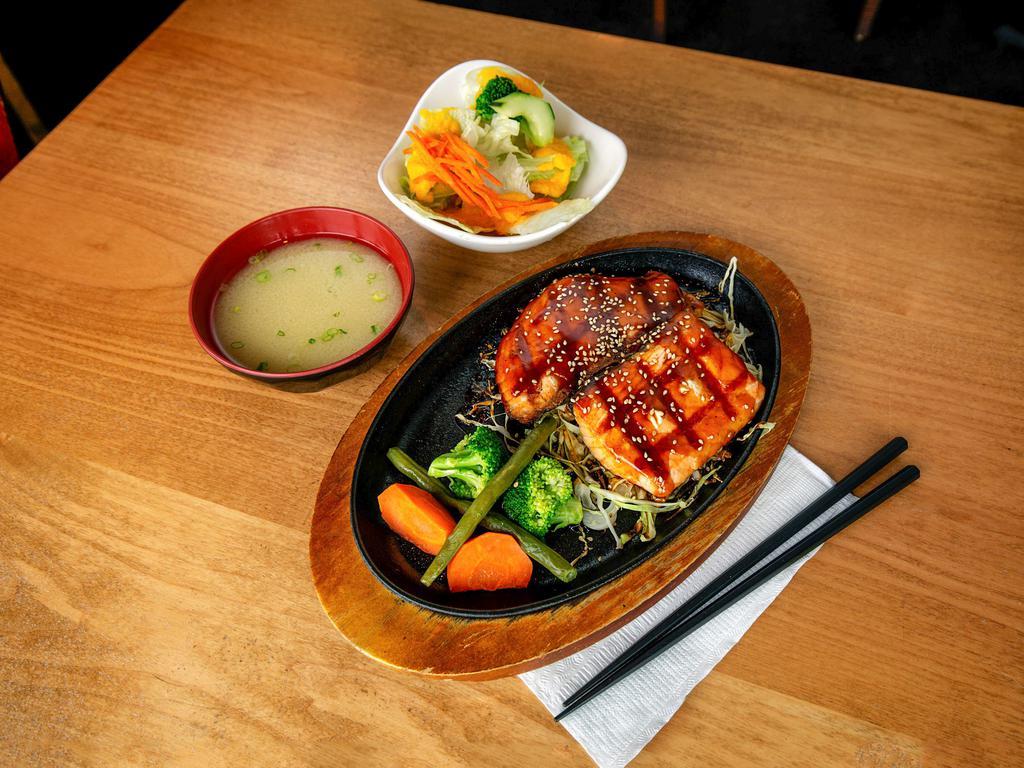 Salmon Teriyaki · Grilled salmon, teriyaki sauce, steamed vegetables, and sesame seed. Served with small Mio salad.