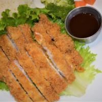Tenkatsu · Crispy fried breaded pork cutlet, tonkatsu sauce, steamed vegetables. Served with rice and s...