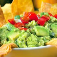 Jose’s Guacamole · Made with fresh avocados, lime juice, tomatoes and cilantro, served with tortilla chips.