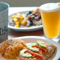 Boca Style Grouper · Grouper filet breaded and pan-sautéed topped with sliced avocado and tomato garnished with a...