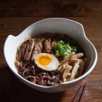 Chicken Shoyu · Chicken and fish broth, topped with grilled chicken, soft boiled egg, bamboo shoot, black fu...