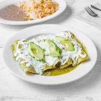 Enchiladas · A warm tortilla wrapped around your choice of filling and then bathed in sauce and topped of...
