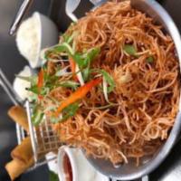 Crispy Noodle · Crispy thin noodles tossed with sweet tamarind fruit sauce with red tofu and scallions.