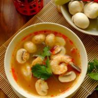 Tom Yum Soup · Hot and sour lemongrass soup with mushrooms. Mild spicy.