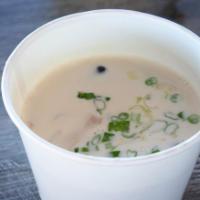 Tom Kha Gai Soup  · Creamy soup with coconut milk, chicken, mushrooms flavored with galangal, lemongrass and kaf...