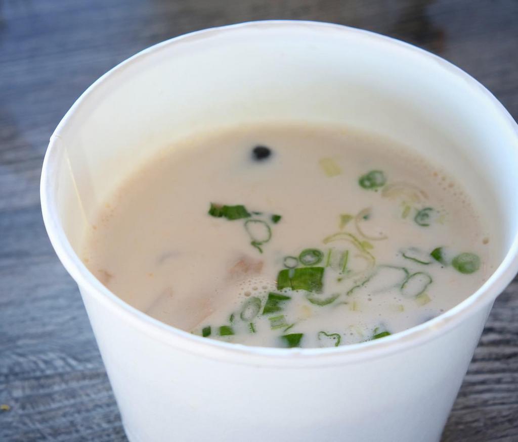 Tom Kha Gai Soup  · Creamy soup with coconut milk, chicken, mushrooms flavored with galangal, lemongrass and kaffir lime leaves.