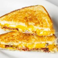 Grilled Cheese · American cheese, white bread.