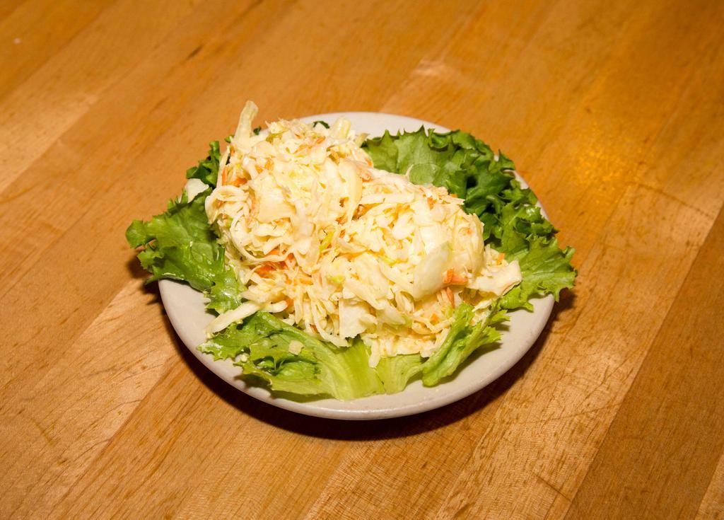 Homemade Creamy Coleslaw · Every day, a perfect side with any meal, coleslaw is made with green cabbage and carrots in mayonnaise, vinegar based dressing. A great compliment to most sandwiches as a condiment.