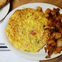 Western Omelette · Three farm fresh egg omelet with green peppers, onions and ham.