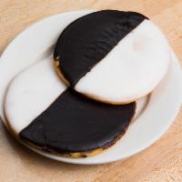 Black and White Cookie · Black and white cookies are the unofficial official cookie of new york. Big and delicious.