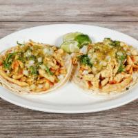 Street Tacos · 1 taco soft double corn tortilla choice of chicken, pastor or carnitas with cilantro, onions...