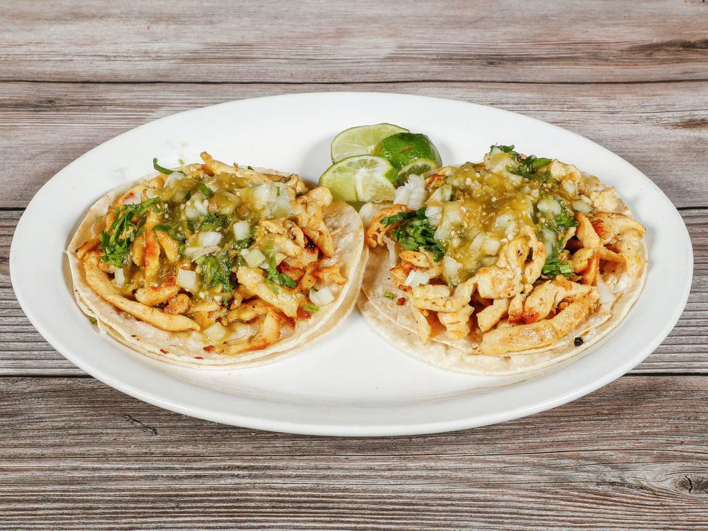Street Tacos · 1 taco soft double corn tortilla choice of chicken, pastor or carnitas with cilantro, onions, and salsa each.